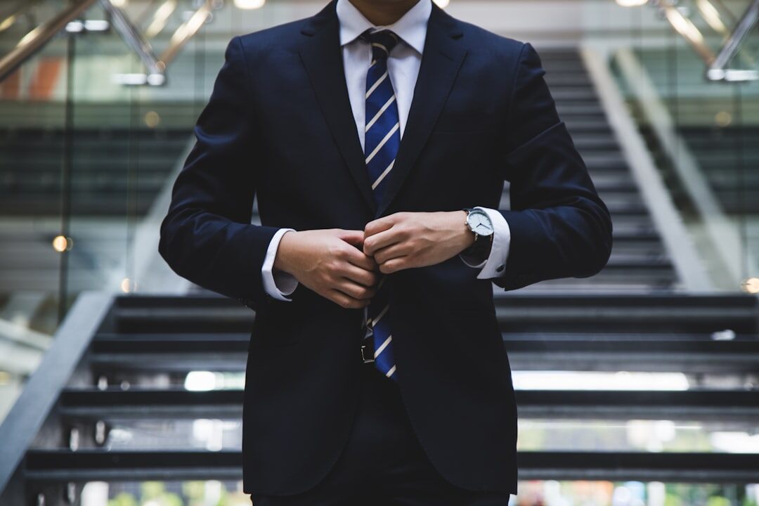 Portrait of a Belgian businessman in his forties wearing a suit